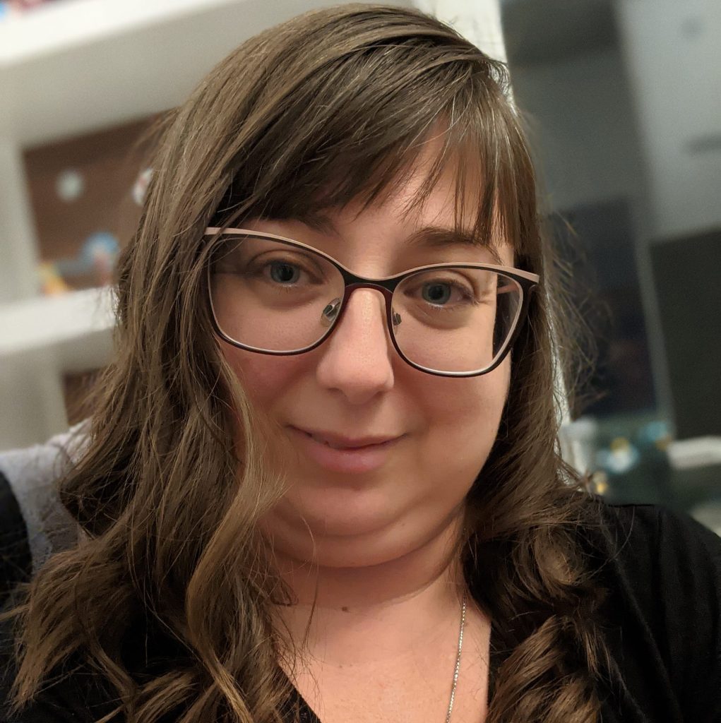 Picture of Marie-Eve Veilleux, a white woman with brown shoulder length hair and glasses